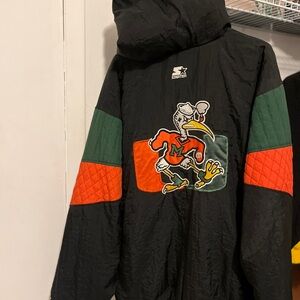 Starter Black Jacket with Green and Orange Accents LIKE NEW FROM 1996